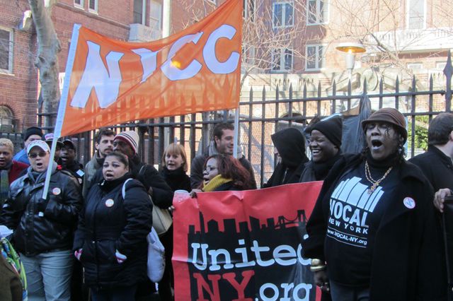 Fast food workers protest outside of Auburn Family Reception Center in Fort Greene